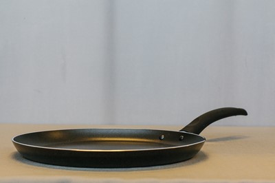 Bakpan met antiaanbaklaag
